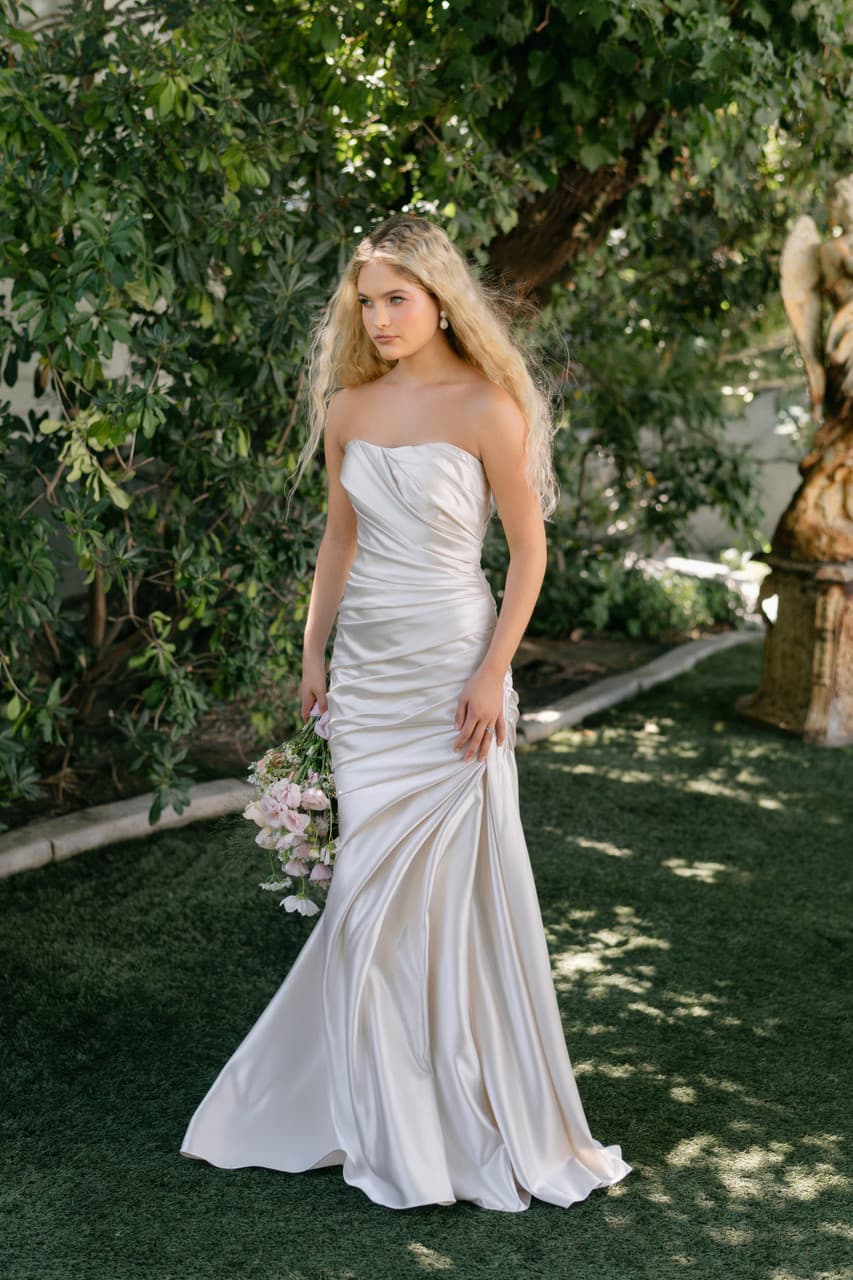Strapless satin mermaid wedding dress with ruched bodice and fitted silhouette front view