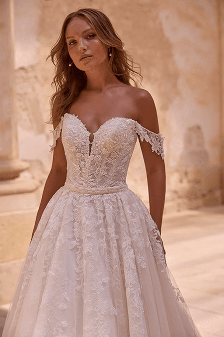 Off the shoulder neckline wedding dress with lace detail