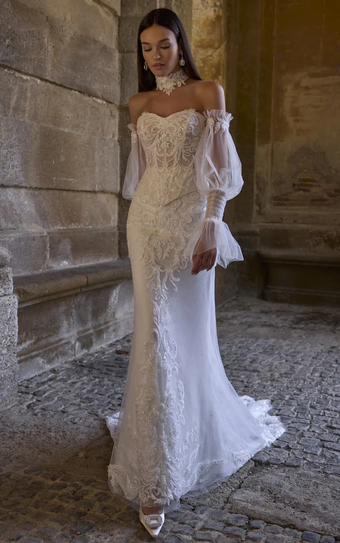 Atlas 63207- Veni Infantino wedding dress by Veni Infantino - Romantic and refined, this off-the-shoulder wedding gown exu