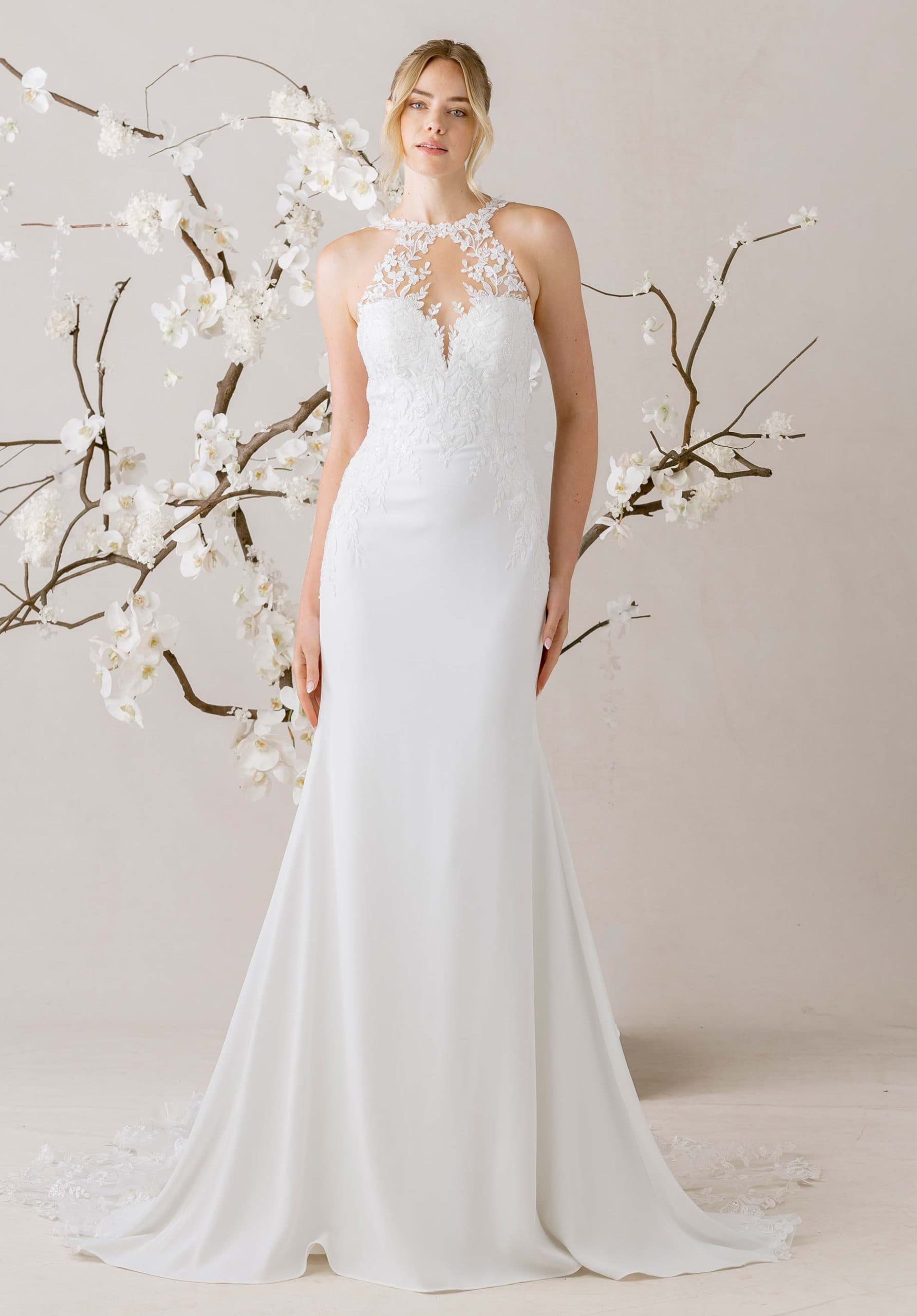 Sai - Morilee wedding dress by Morilee Sheath wedding dress has an illusion halter neckline, split... view 1