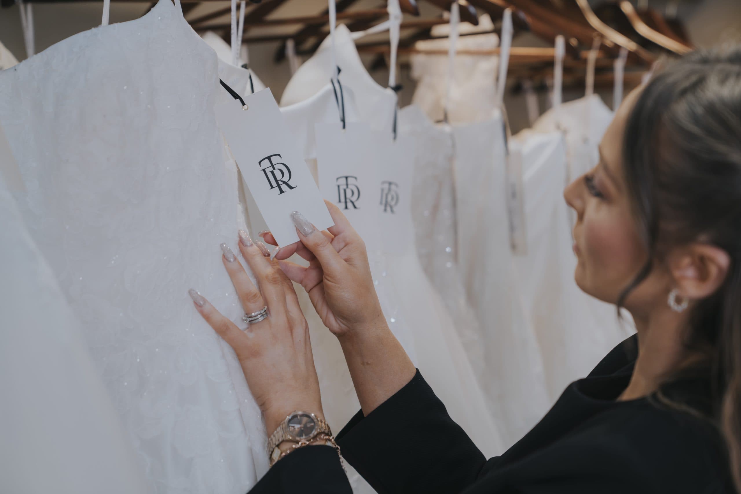 Wedding dresses displayed in the TDR Bridal boutique showcasing designer bridal collections