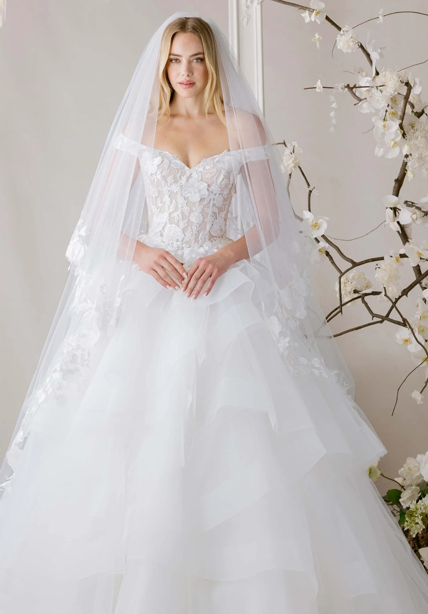 Morilee Kya wedding dress with V-neck lace bodice and flowing chiffon A-line skirt
